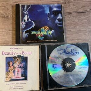 Beauty and the Beast and Space Jam CDs